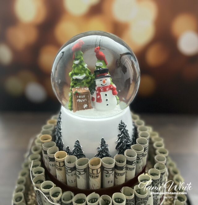 Attach topper. I used a snow globe music box, but you can use anything.