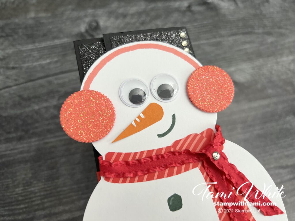I wanted the ear muffs to be sparkly and match the Black Glitter Paper. To create this effect I used Shimmery Embossing Paste colored with Flirty Flamingo and then cut it with the Layering Circles dies. See the video for tips and instructions on how to create these.